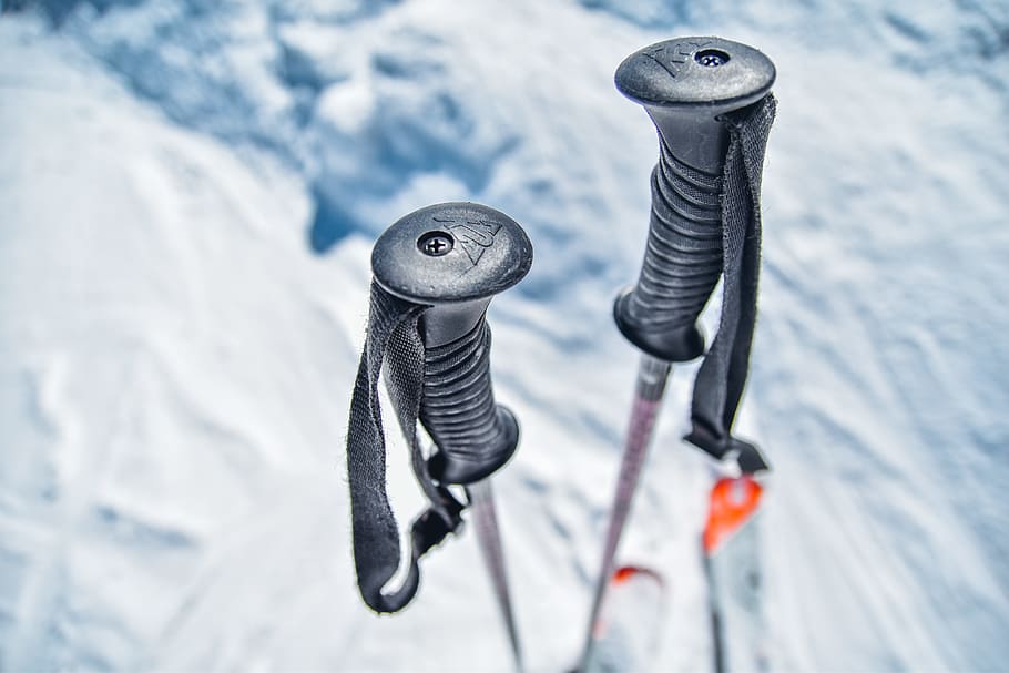 snow ski sticks on snow, black snow skis on ice, shallow focus HD wallpaper