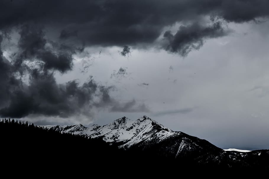 snowy mountain under dramatic clouds, landscape photograph of mountain during cloudy day HD wallpaper