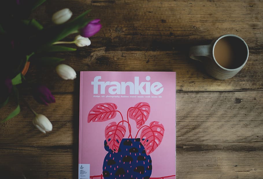 Frankie book near a cup of coffee, Frankie book near gray ceramic mug and white tulip flowers HD wallpaper