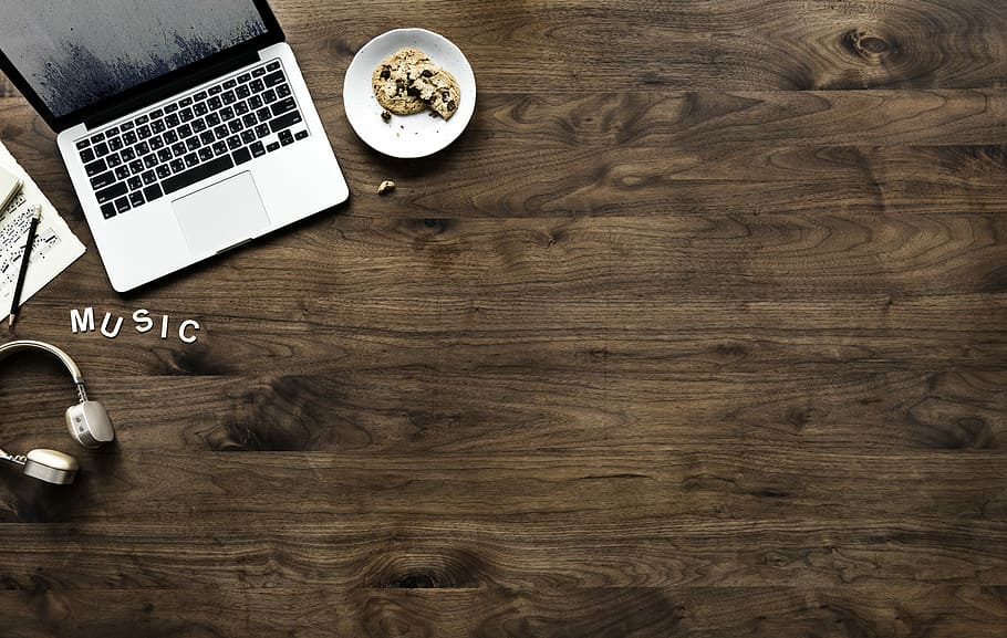 MacBook Pro, desk, table, computer, work, headphones, wood - material HD wallpaper