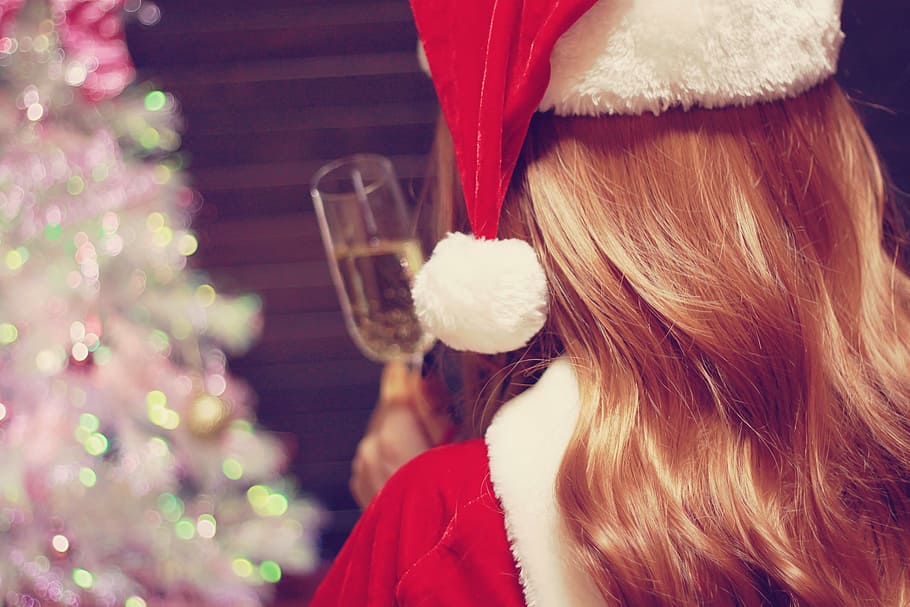 woman wearing red christmas hat and red coat, women, celebration HD wallpaper