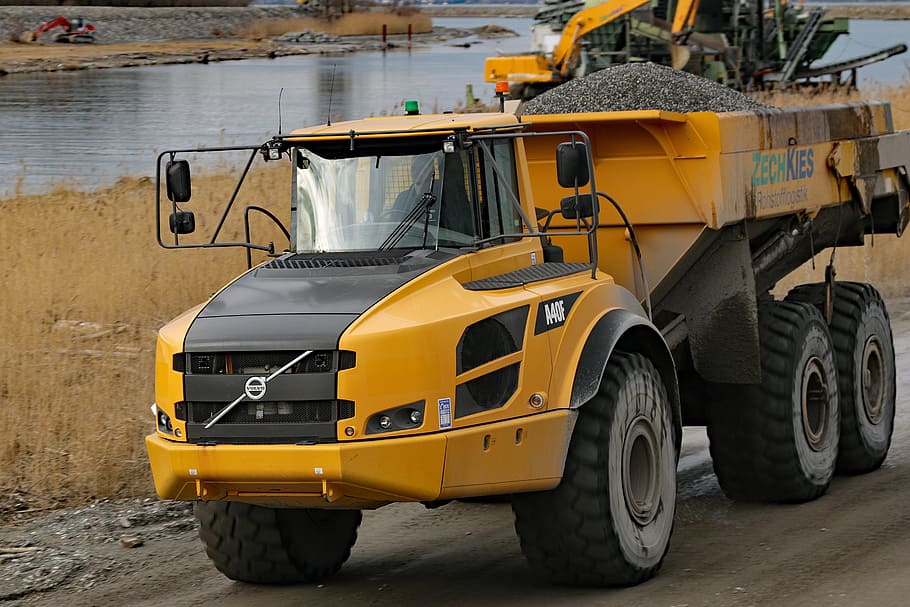 yellow and black Volvo dump truck on road near river, Loader, HD wallpaper