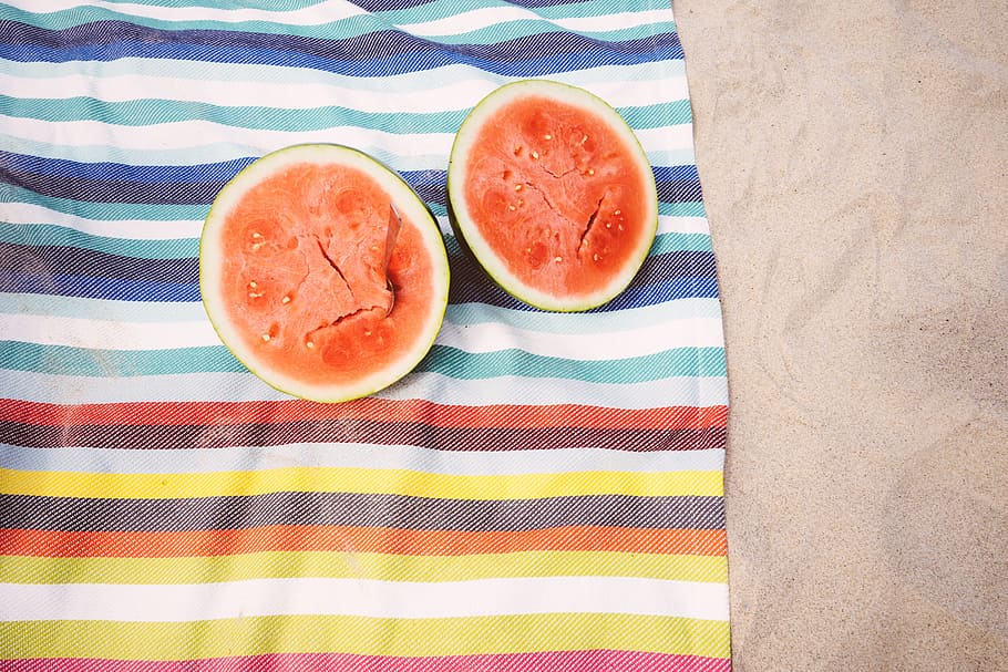 two slice watermelons, beach, blanket, fruit, looking down HD wallpaper