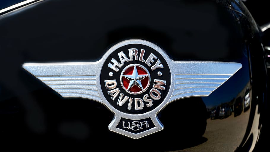 HD wallpaper: chrome Harley-Davidson emblem on black surface, harley