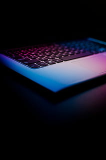black and silver laptop computer, gray and purple laptop on black surface HD wallpaper