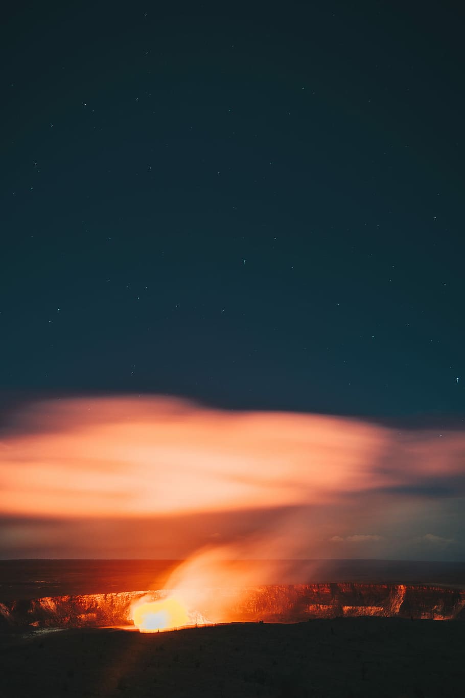 bonfire surrounded by rocky cliff at nighttime, photo of bonfire during night time HD wallpaper