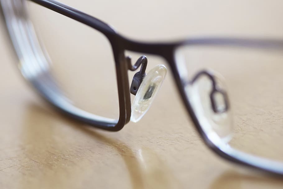 gray framed eyeglasses on brown table in shallow photography during daytime, HD wallpaper