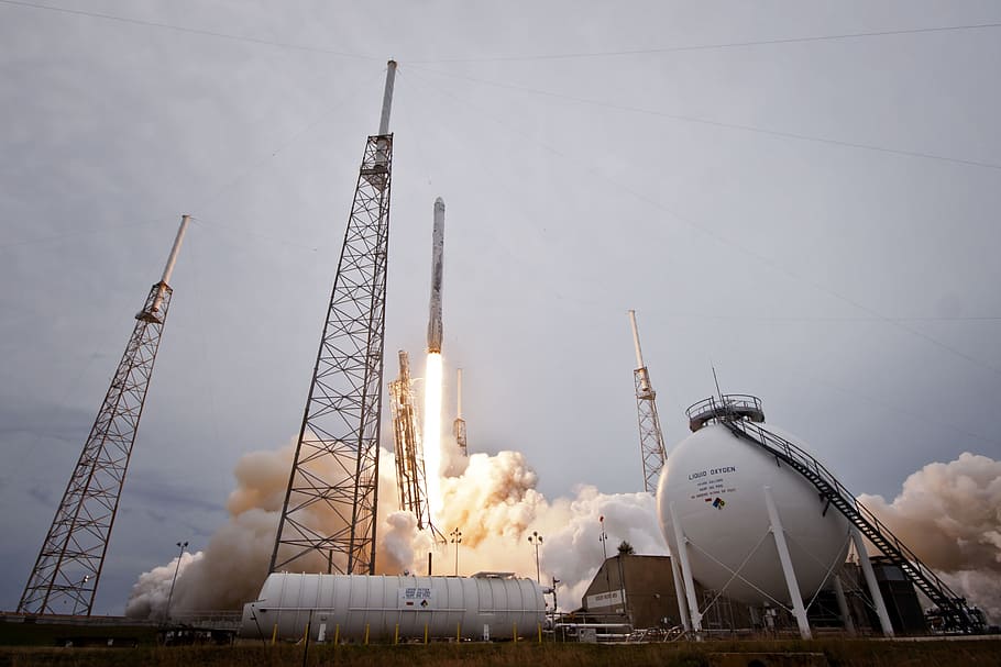 rocket launches on space station, spacex, lift-off, flames, propulsion