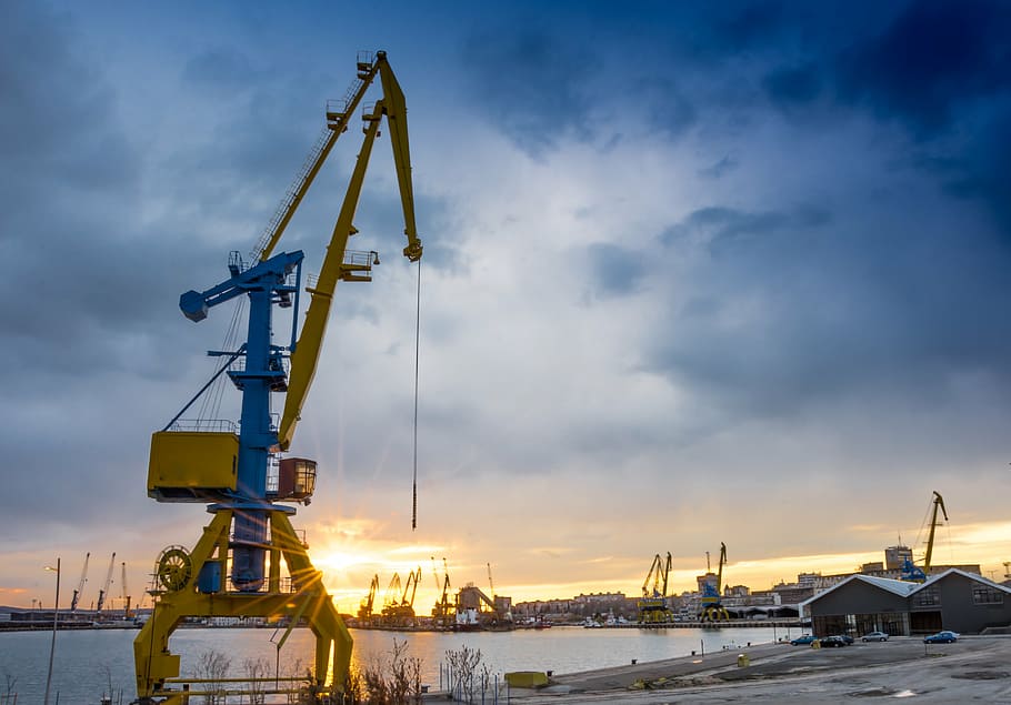 yellow heavy equipment at blue hour, crane, port, sunset, transport, HD wallpaper