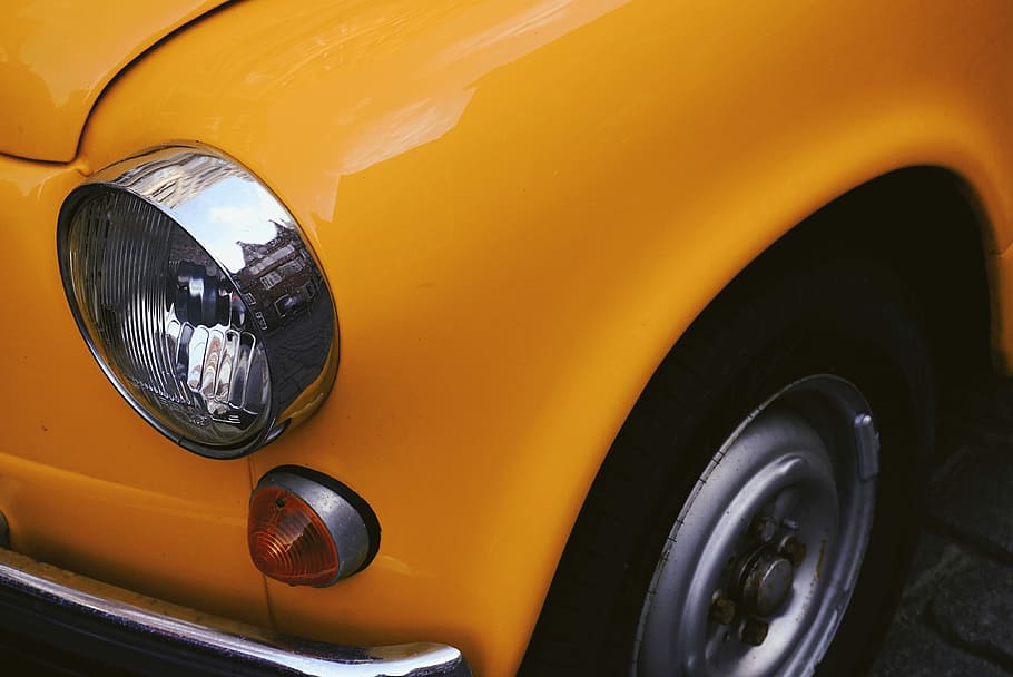 closeup photo of yellow car, closeup photo of orange car, headlight HD wallpaper