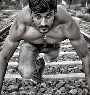 man wearing jeans standing on train tracks, chest, arm, thigh HD wallpaper