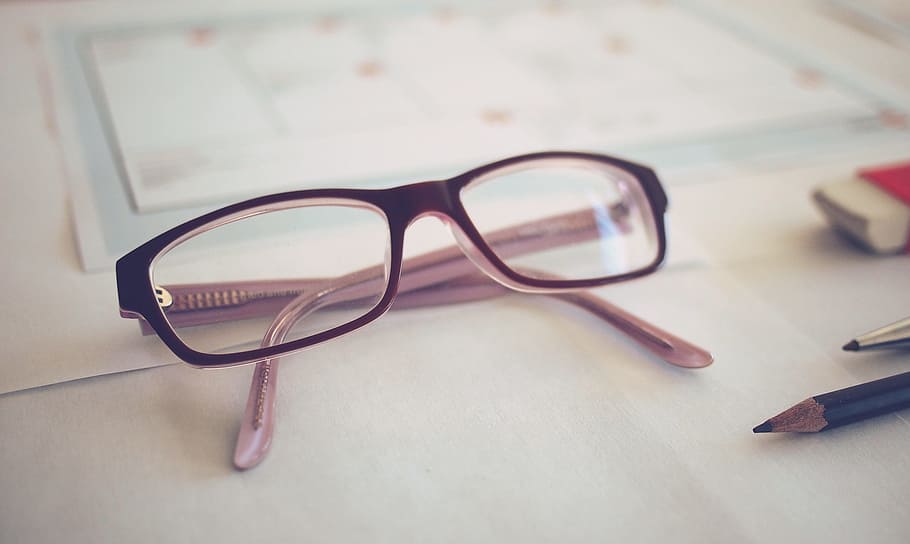 selective focus photography of brown framed eyeglasses, workplace HD wallpaper
