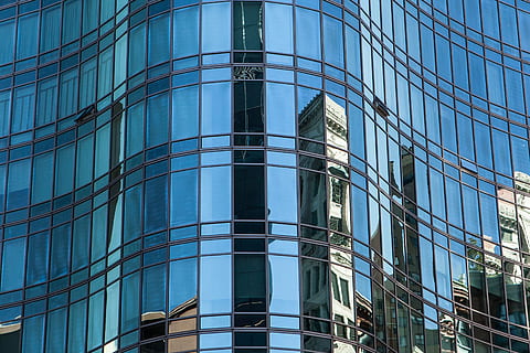 Reflected details on a glass building in Manhattan, New York City HD wallpaper