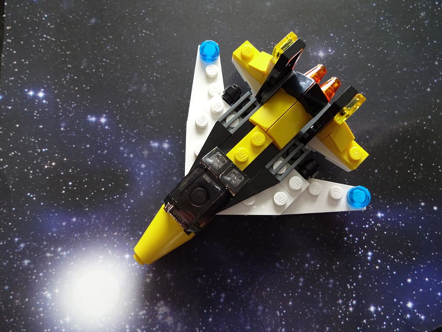 white, yellow, and black spaceship building blocks toy, Lego