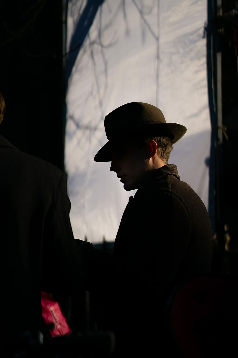 man wearing coat with hat, shallow focus photography of a man with hat HD wallpaper