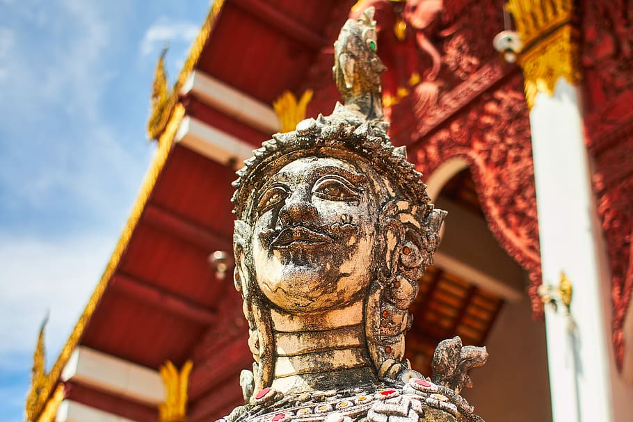 brown concrete statue under red and white roof, ceramic statue outdoor HD wallpaper