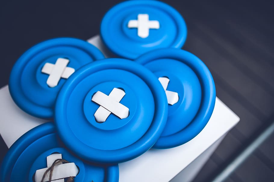 Big blue buttons, close-up, indoors, no people, studio shot, medicine HD wallpaper
