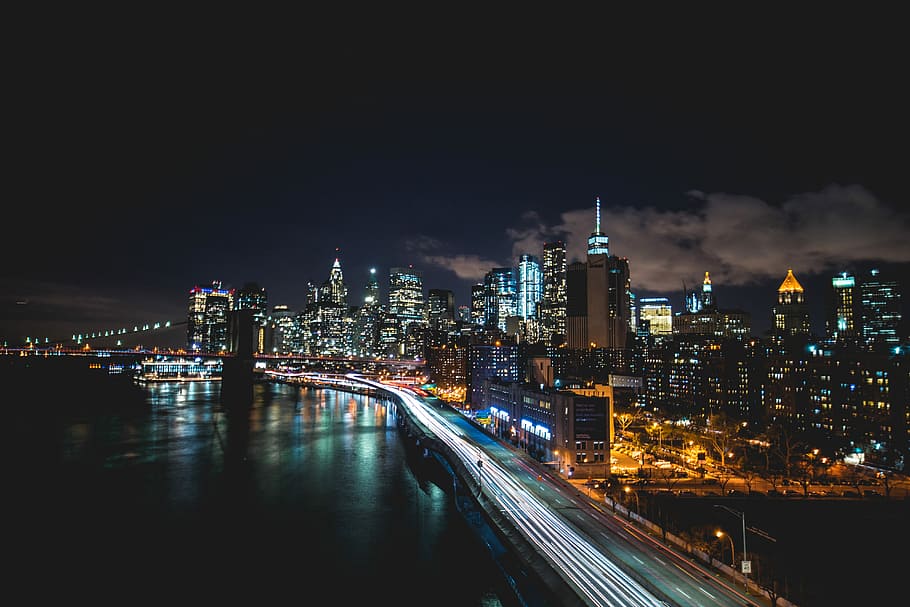 timelapse photography of cars, time lapse photo of bridge beside city at night time HD wallpaper
