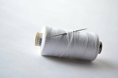 white thread on white surface, spool, needle, sew, yarn, sewing HD wallpaper