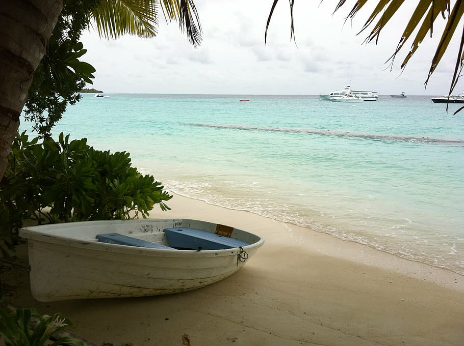 white rowboat on beach with calm sea at daytime, maldives, landscape HD wallpaper