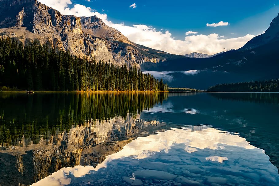 landscape photo of body of water within mountain range, canada HD wallpaper