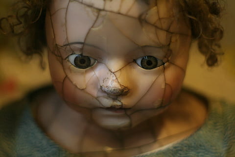 selective focus photography of porcelain doll, broken brown haired infant doll HD wallpaper