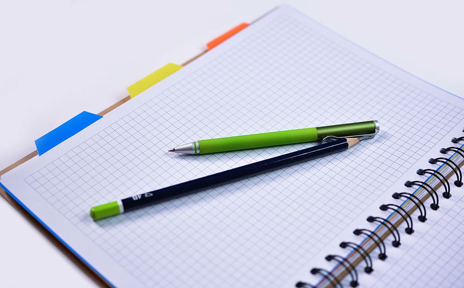 green click pen and black pencil on graphic notebook, education HD wallpaper