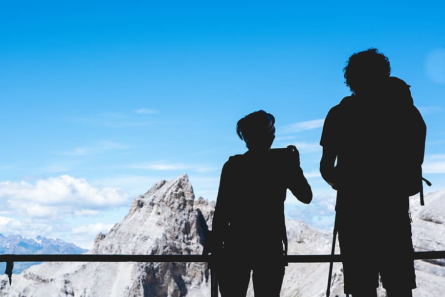 two persons overlooking mountain ranges, silhouette, rocky HD wallpaper