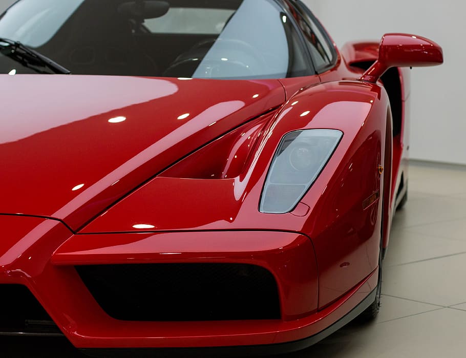red Ferrari sports car inside showroom, design, auto, vehicle HD wallpaper