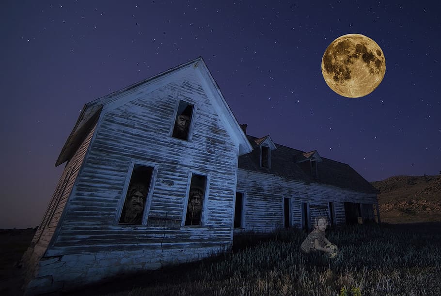 photo of old white house under full moon, haunted house, stars