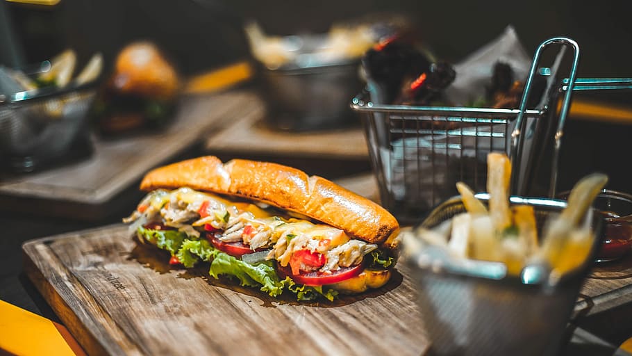 sandwich, fries beside silver strainer, food, roll, sub, basket HD wallpaper