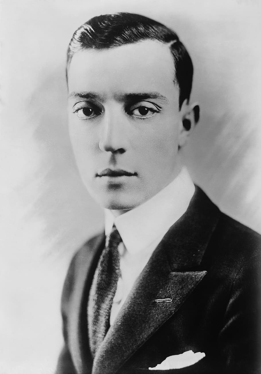 grayscale photography of man wearing black suit, buster keaton