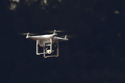 white DJI phantom-series quadcopter flying during daytime, white quadcopter with camera HD wallpaper