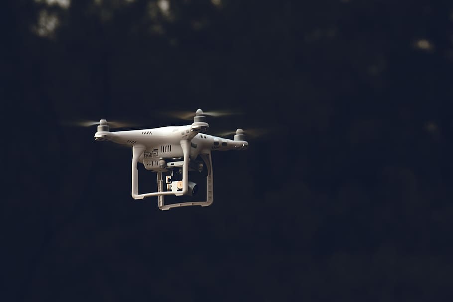 white DJI phantom-series quadcopter flying during daytime, white quadcopter with camera HD wallpaper
