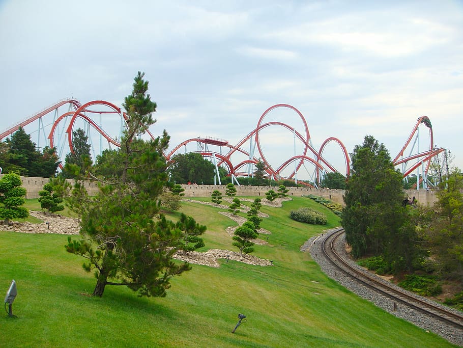 green grass open field across red roller coaster amusement park at daytime, HD wallpaper