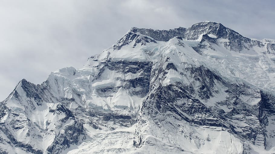 landscape photography of alps mountain, snowcapped mountain under gray sky HD wallpaper