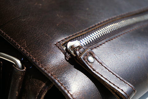 shallow focus photo of brown leather bag, zip, leather case HD wallpaper