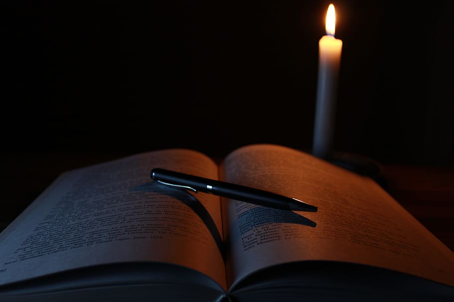 black click pen on open book near cnadle, candle, old, light HD wallpaper
