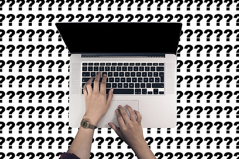person using MacBook Pro, laptop, keyboard, hands, question mark HD wallpaper