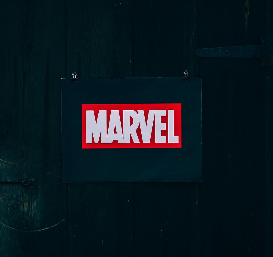 Marvel logo on black wooden board, Marvel logo, brand, poster