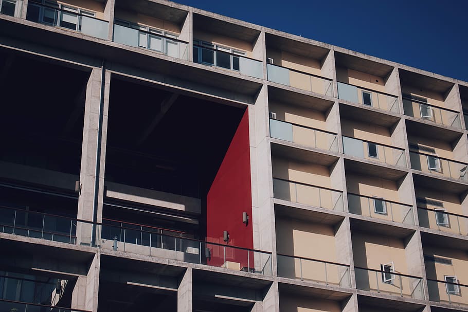 white concrete building, low angle photo of white and red painted building HD wallpaper