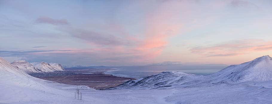 show covered mountain during daytime, landscape photography of snow coated ground near body of water HD wallpaper