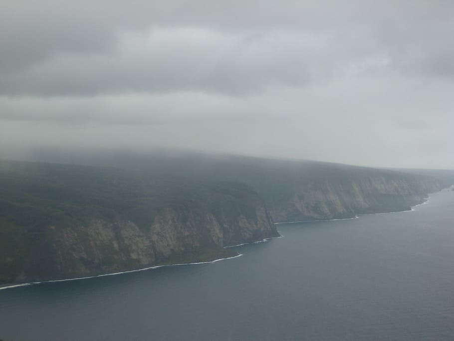 misty, mountain, cliff, ocean, clouds, outside, water, sea HD wallpaper