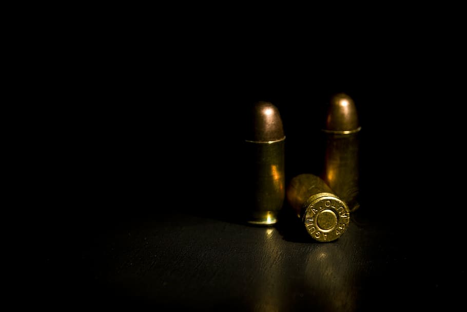 three gold bullets, muntition, ball, acp, goddamn 45, shoot, floor