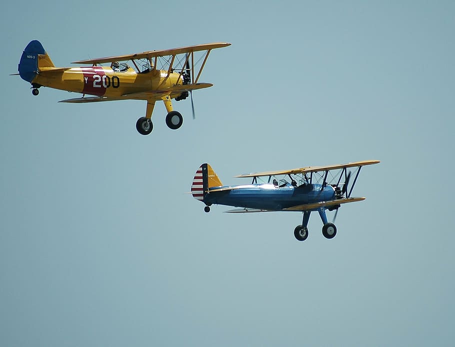 two yellow and blue bi planes, bi-planes, aircraft, airshow, sky, HD wallpaper