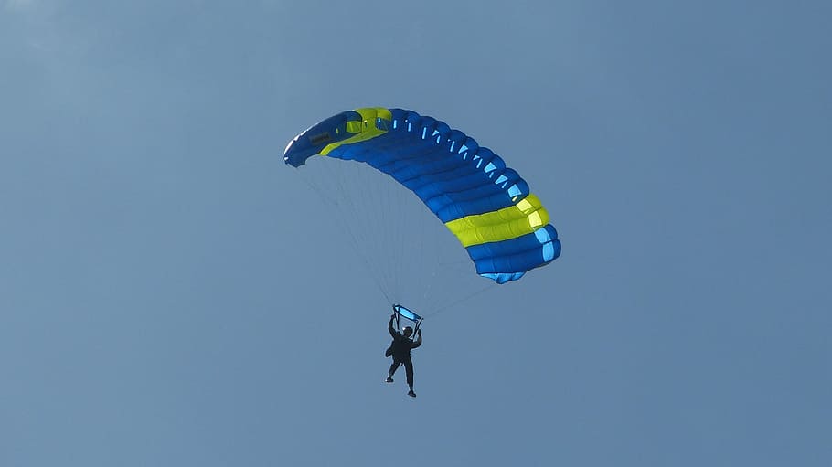silhouette of a person paragliding in air during daytime, parachute HD wallpaper
