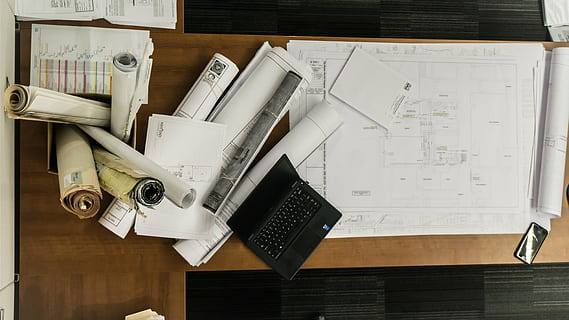 close up photo of black laptop computer beside papers, drawing HD wallpaper