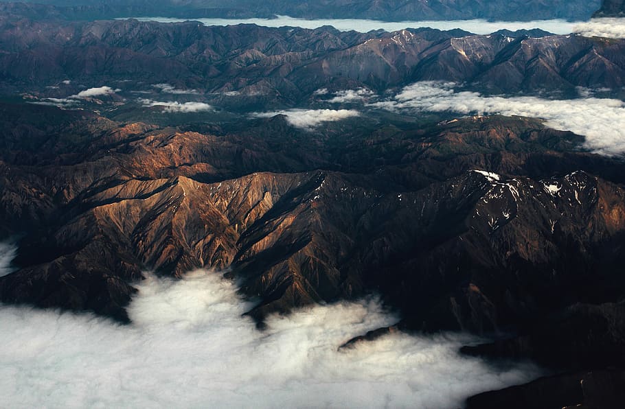 aerial photo of brown hills beside clouds at daytime, aerial photography of mountain range HD wallpaper