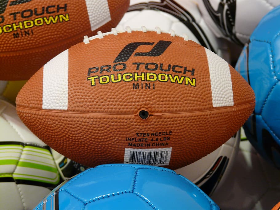 brow nand white Pro Touch football, American Football, Pigskin
