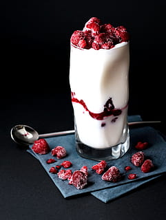 red raspberries on clear drinking glass, white liquid filled drinking glass with raspberry lot HD wallpaper